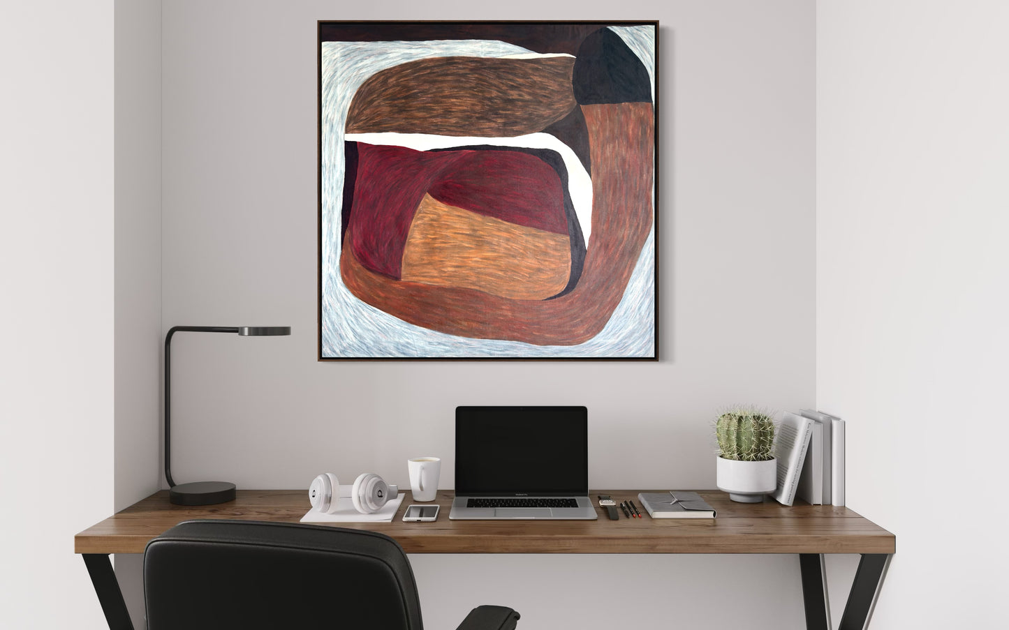 abstract painting in red brown palette styled in contemporary interior space