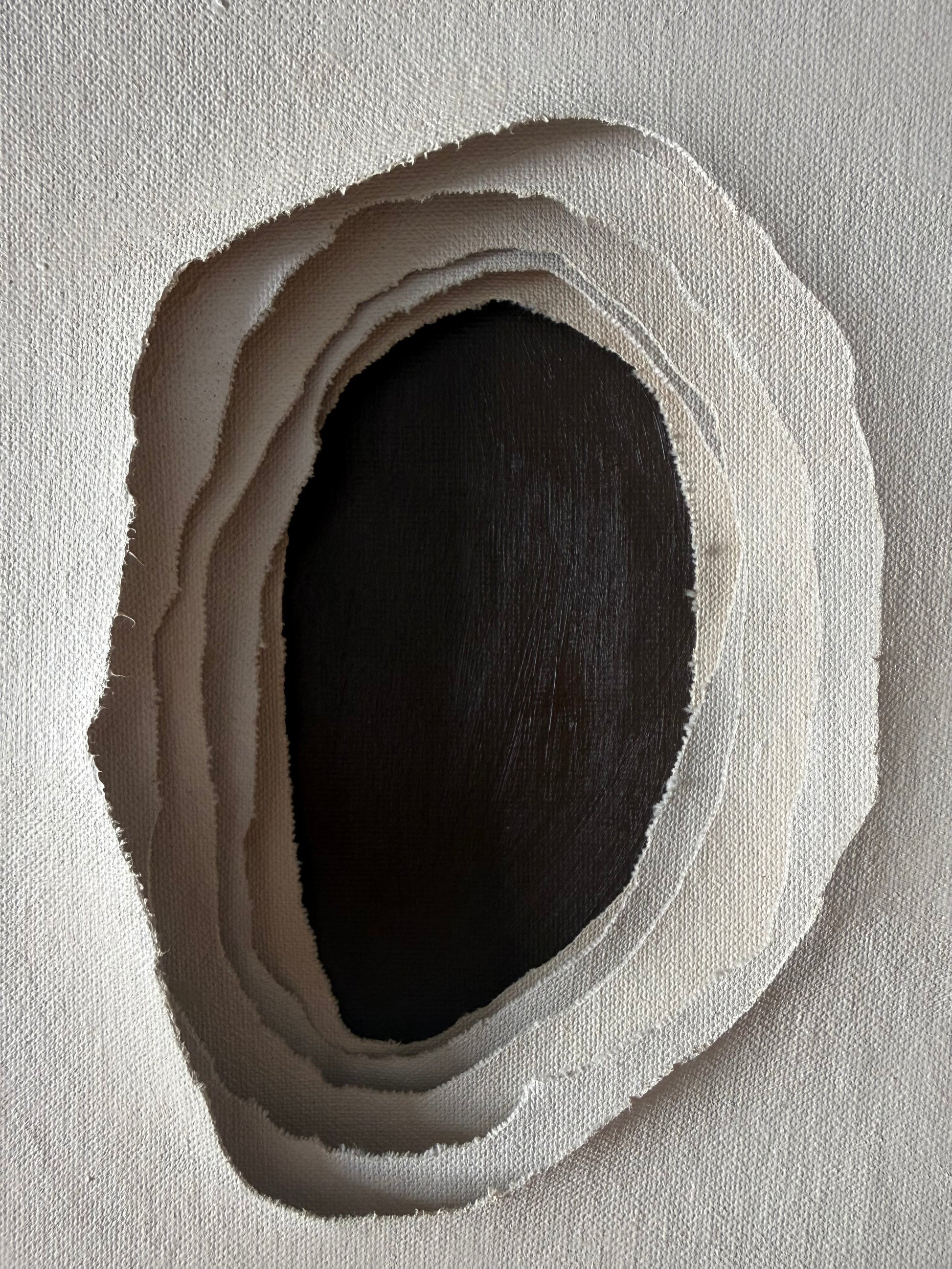 Detail of Whole I abstract painting showing layered contours around a central opening